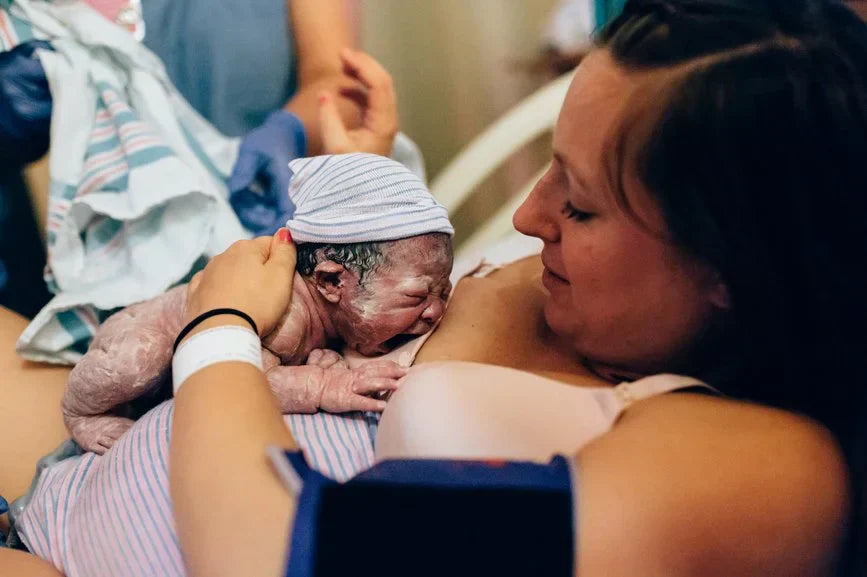 Mom with Baby on Chest after just given birth