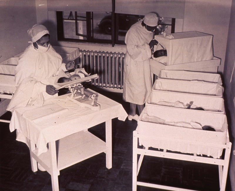 Still image of Nurses and African American Newborn