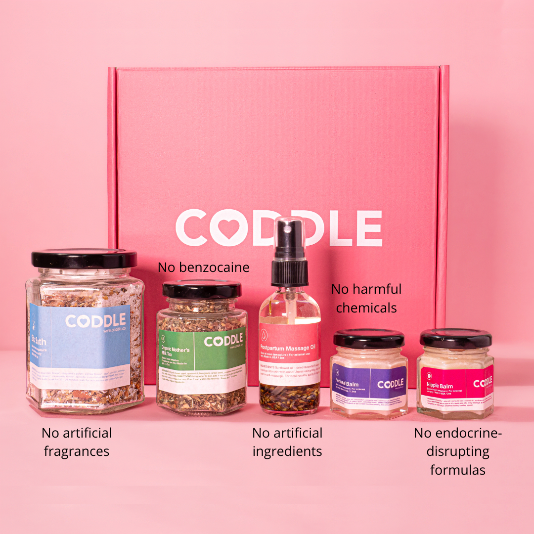 CODDLE Postpartum Kit products with a pink background