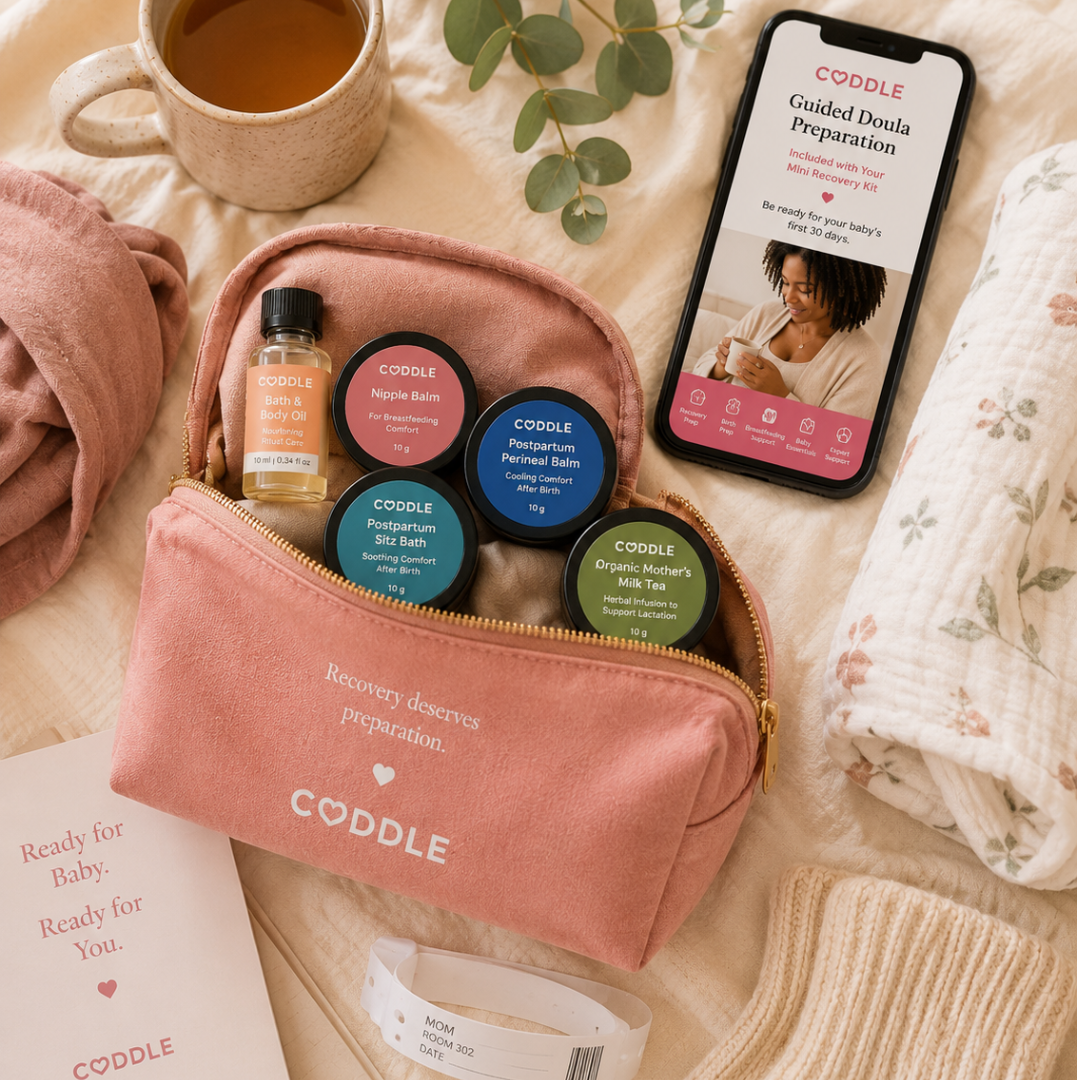CODDLE Mini Postpartum Recovery Kit packed in a blush cosmetic pouch with postpartum recovery essentials, perfect for a hospital bag, travel, or bedside recovery care.