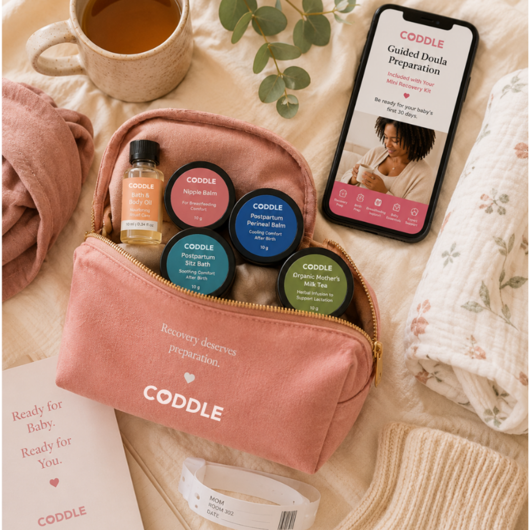 CODDLE Mini Postpartum Recovery Kit packed in a blush cosmetic pouch with postpartum recovery essentials, perfect for a hospital bag, travel, or bedside recovery care.